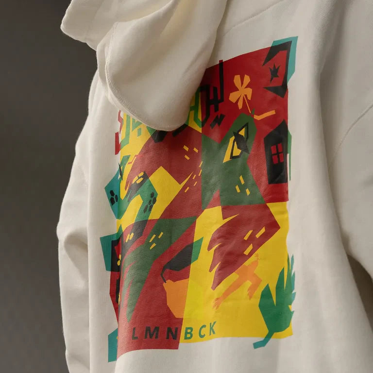 The Return Hoodie by Naji Al-Ali LMNBCK — premium cotton hoodie with bold colourful LMNBCK graphic illustration