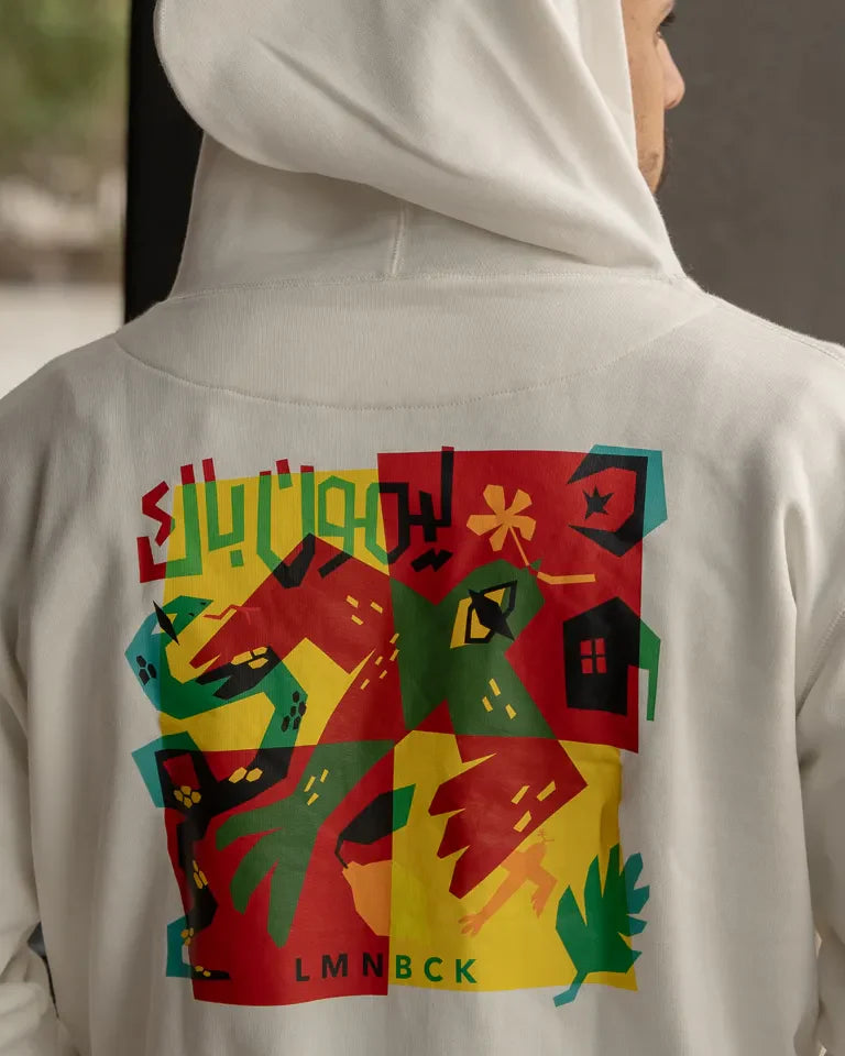 The Return Hoodie by Naji Al-Ali LMNBCK — premium cotton hoodie with bold colourful LMNBCK graphic illustration