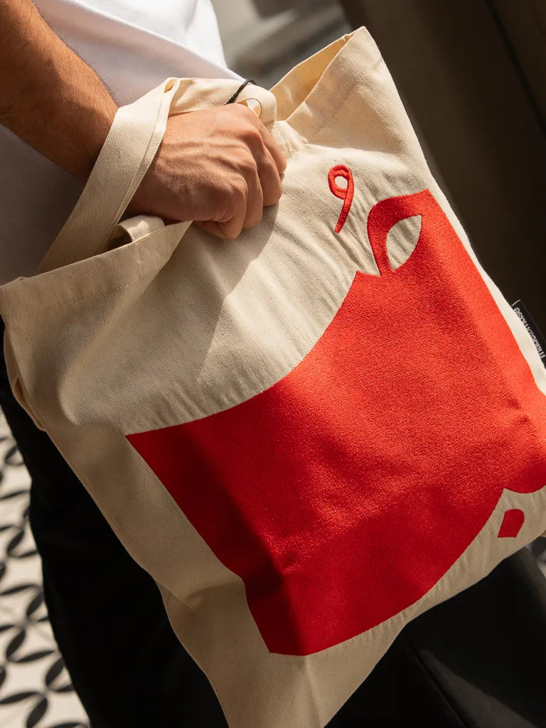 Hob Tote Bag by Ibrahim Zaki — natural canvas tote with embroidered Arabic word Hob in bold typography