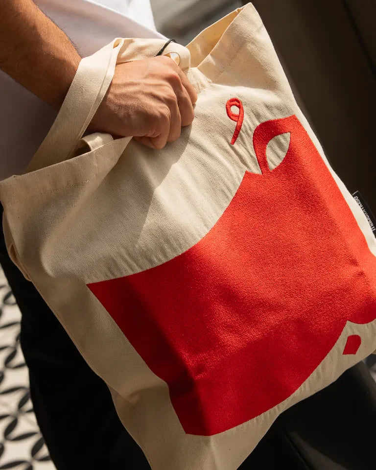 Hob Tote Bag by Ibrahim Zaki — natural canvas tote with embroidered Arabic word Hob in bold typography
