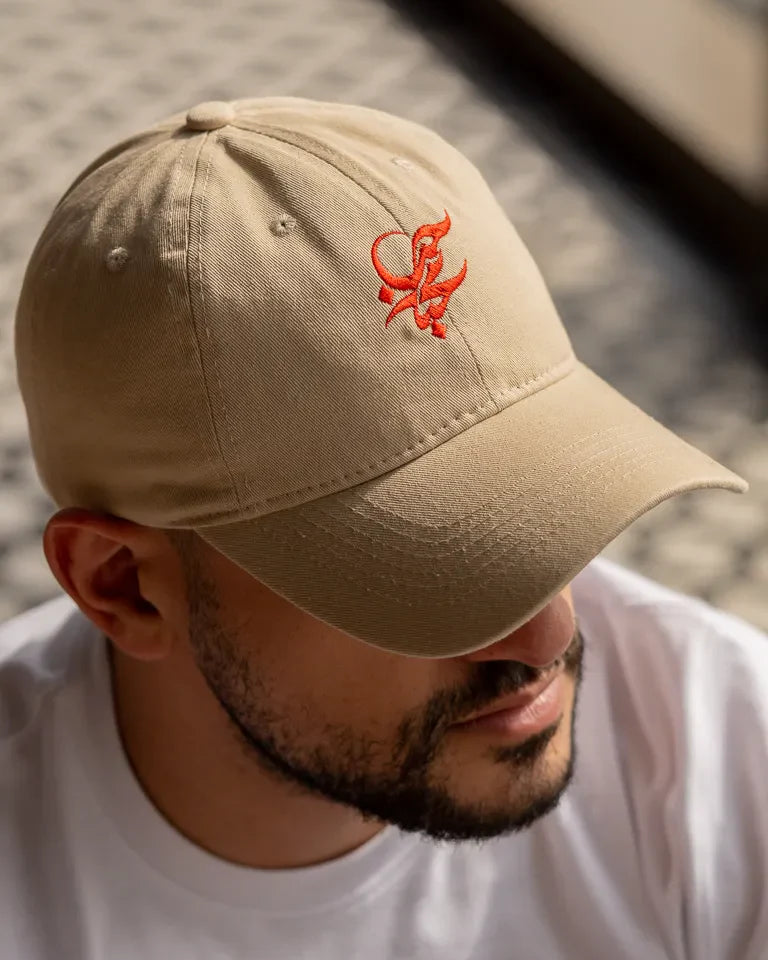 Letters of Love Cap by Wissam Shawkat — embroidered cotton cap with the Arabic word for love in calligraphy