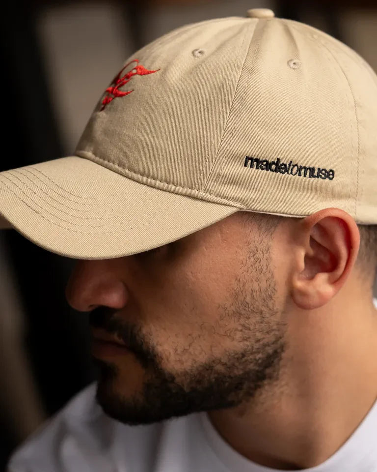 Letters of Love Cap by Wissam Shawkat — embroidered cotton cap with the Arabic word for love in calligraphy