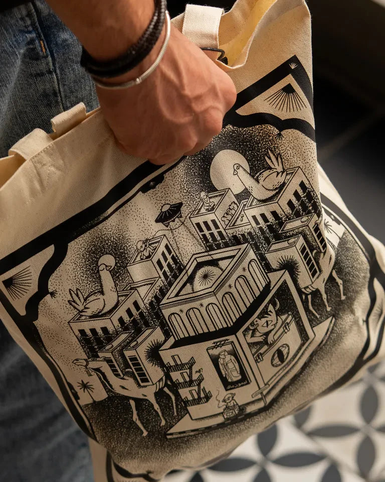 Call Me Tote Bag by Naji Al-Ali LMNBCK — natural canvas tote with detailed black and white LMNBCK illustration