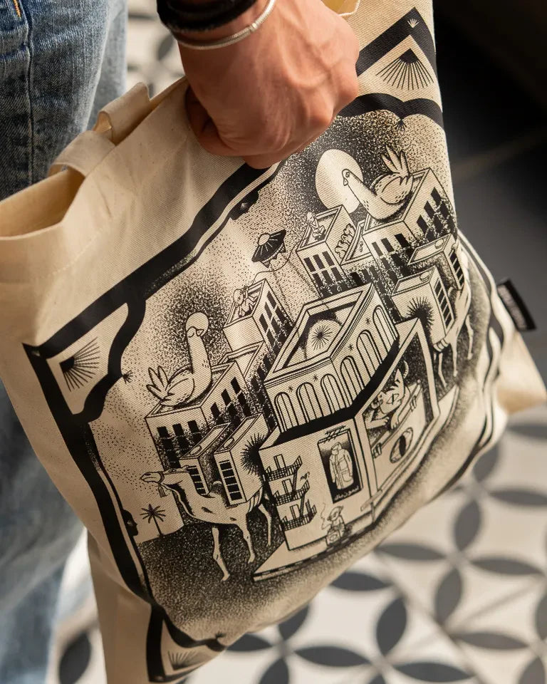 Call Me Tote Bag by Naji Al-Ali LMNBCK — natural canvas tote with detailed black and white LMNBCK illustration