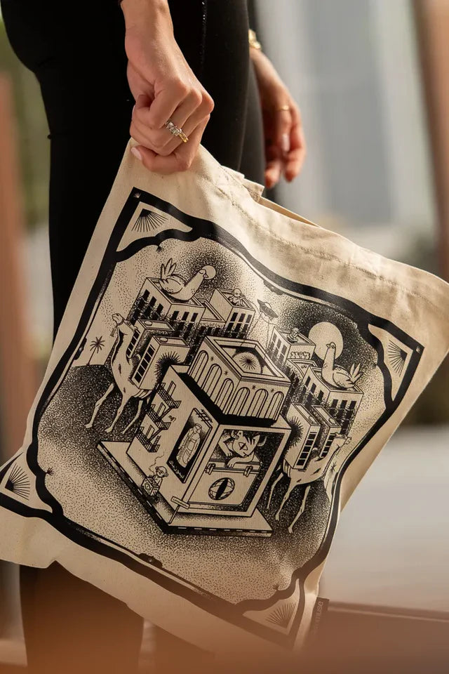 Call Me Tote Bag by Naji Al-Ali LMNBCK — natural canvas tote with detailed black and white LMNBCK illustration