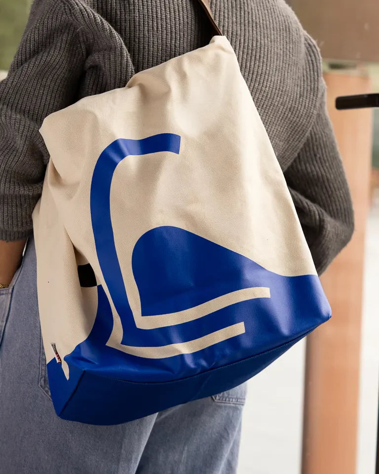Monumental Handbag, Blue by Wissam Shawkat — structured canvas handbag with flowing blue Arabic calligraphy