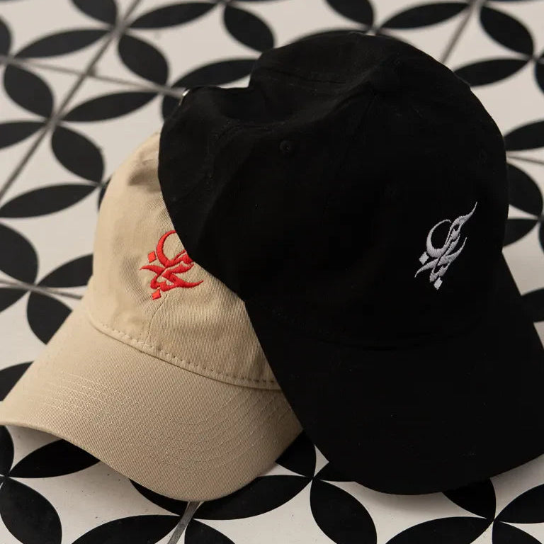 Letters of Love Cap by Wissam Shawkat — embroidered cotton cap with the Arabic word for love in calligraphy