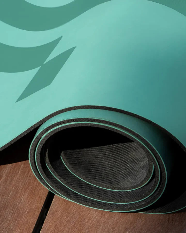 Eternal Yoga Mat by Wissam Shawkat — full-length yoga mat printed with flowing Arabic calligraphy in black and red