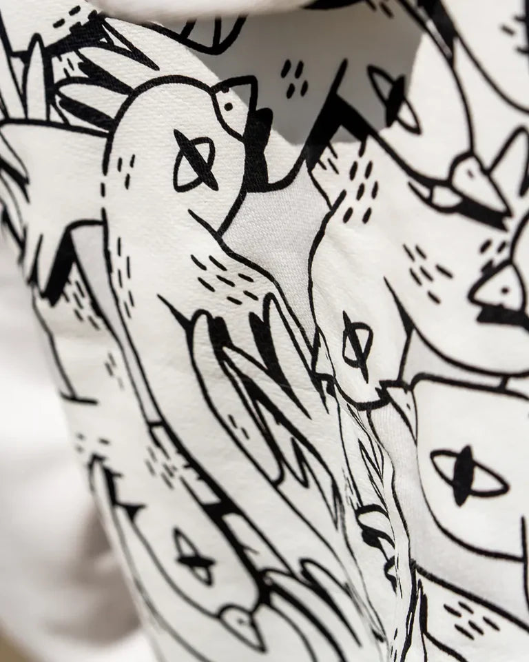 Free Birds Hoodie by Naji Al-Ali LMNBCK — premium cotton hoodie with bold black bird illustration