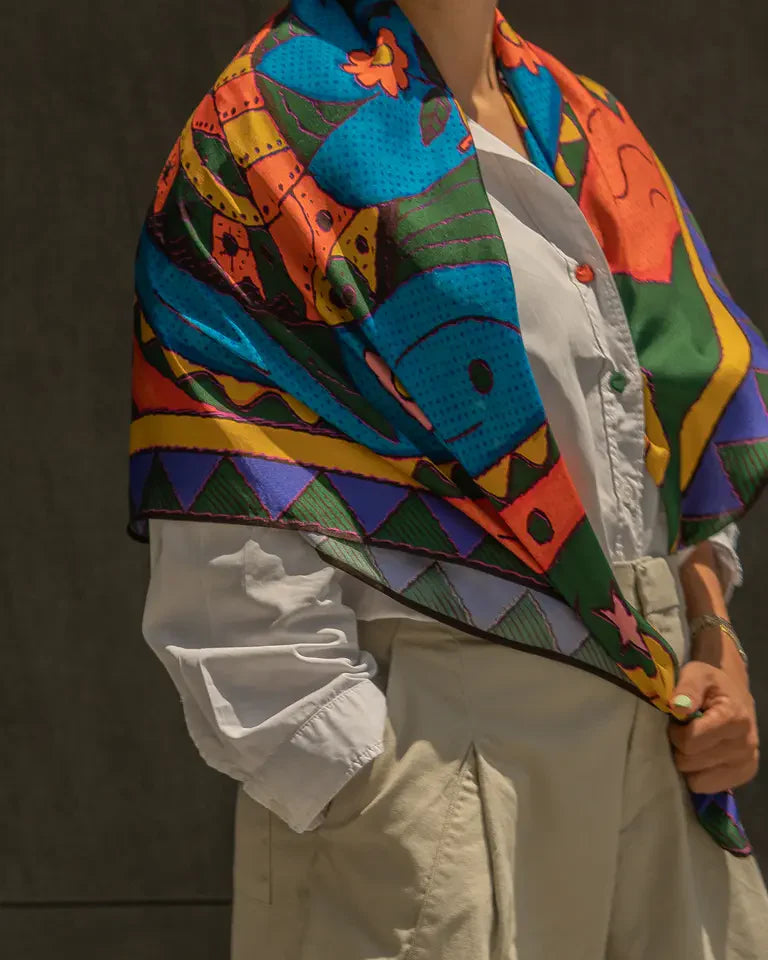 The Fish Silk Shawl by Toka Asal — premium silk scarf with Egyptian Tattoos twin fish illustration in bold colour