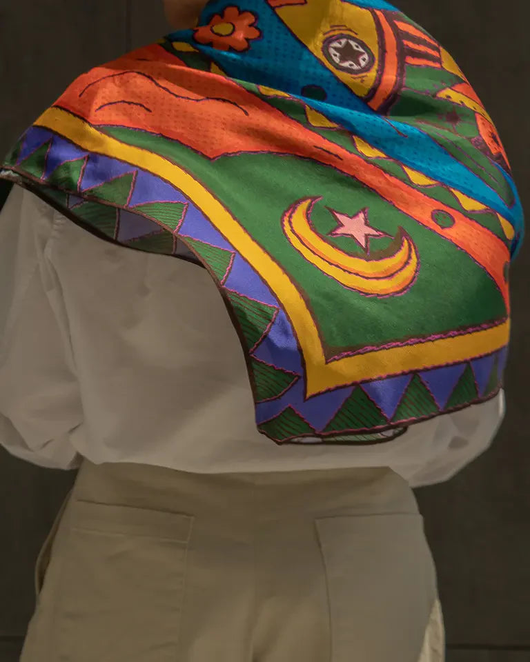 The Fish Silk Shawl by Toka Asal — premium silk scarf with Egyptian Tattoos twin fish illustration in bold colour