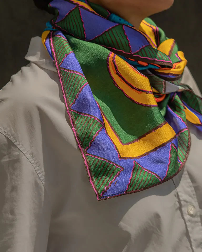 The Fish Silk Shawl by Toka Asal — premium silk scarf with Egyptian Tattoos twin fish illustration in bold colour